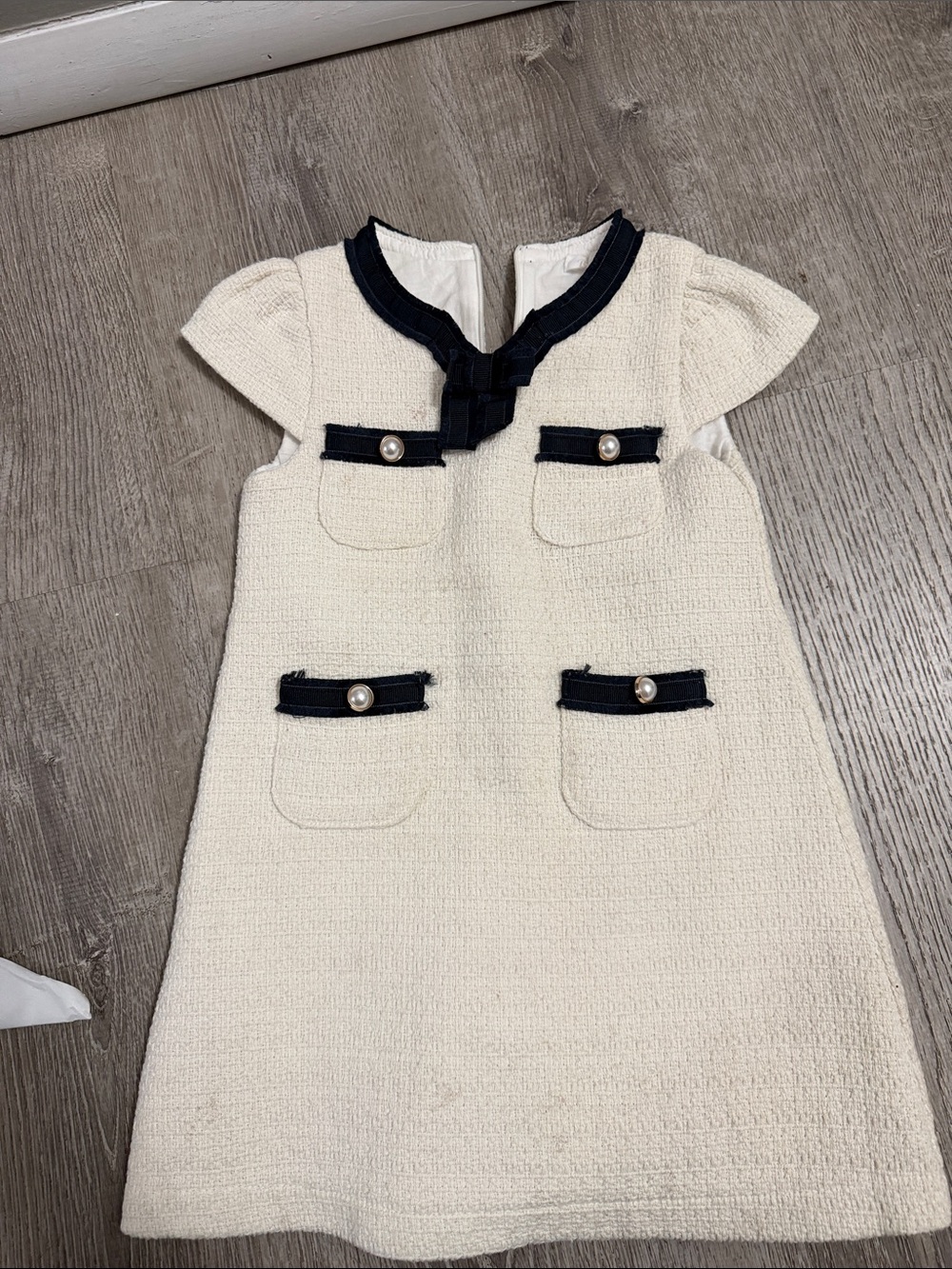 Cream Tweed Girls' Dress with Navy Trim and Pearl Details